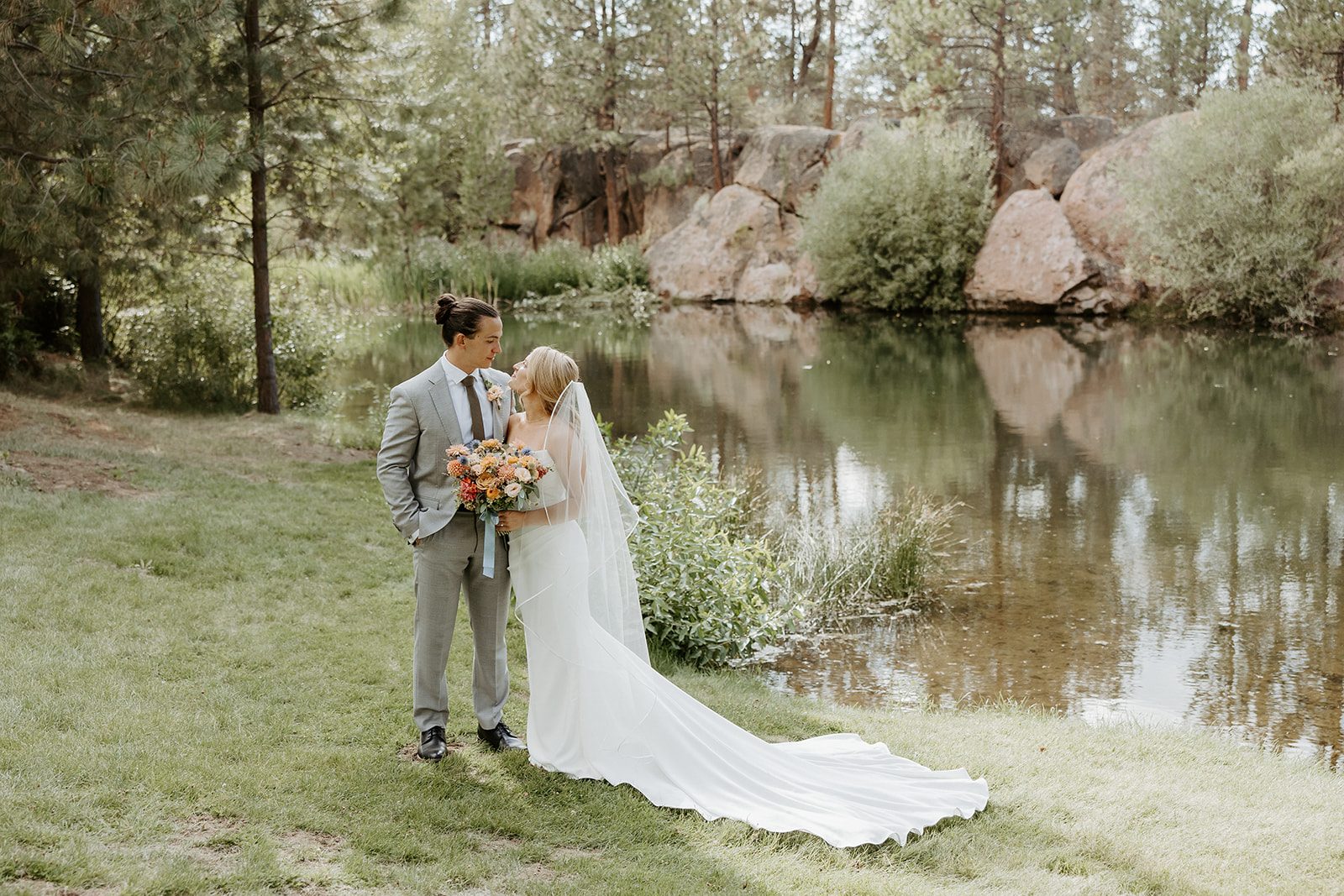 Couple beside the pond at Rock Springs Ranch near Bend.