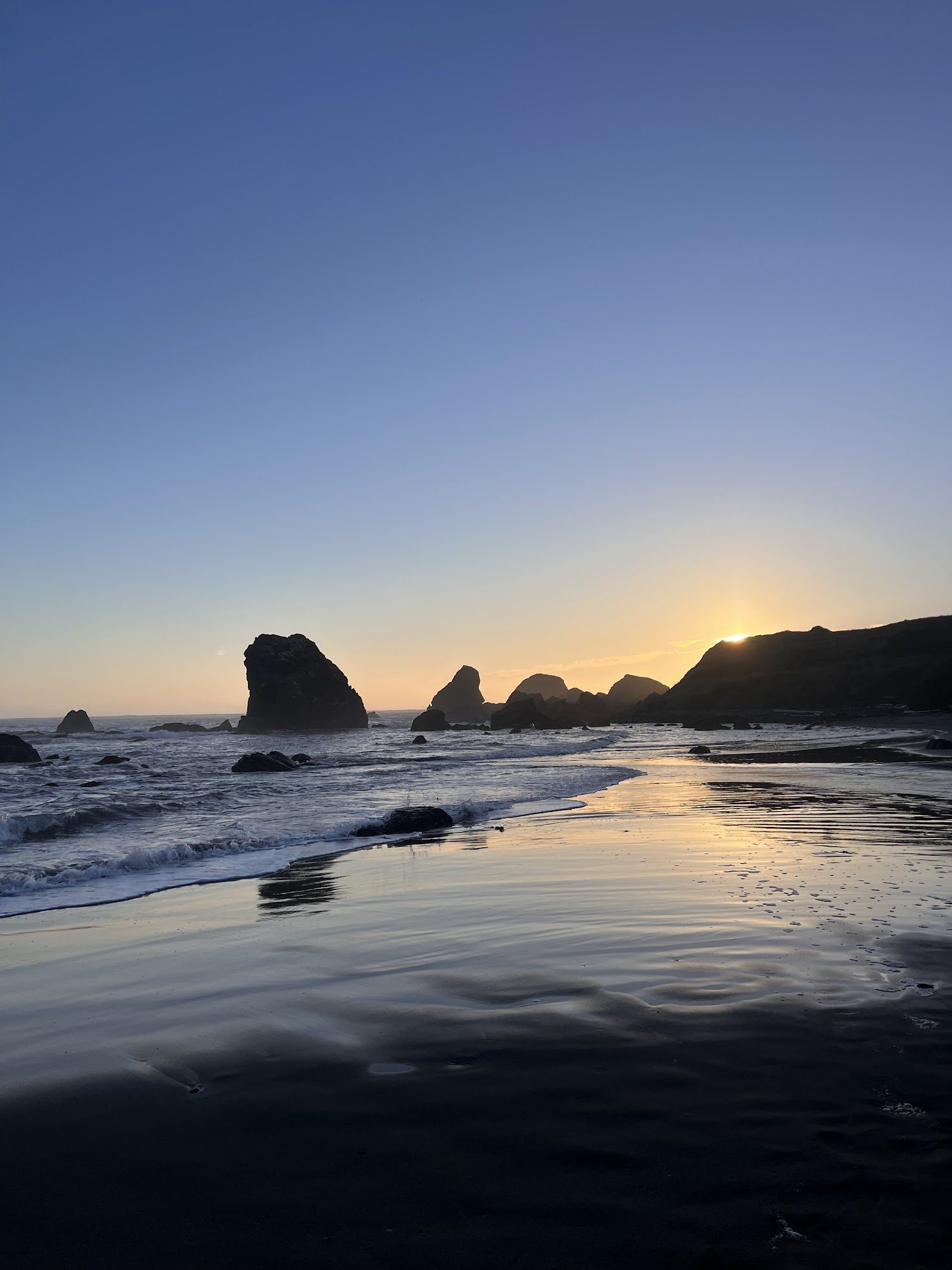 Sunset over the sea stacks at Lone Ranch Beach near Brookings.