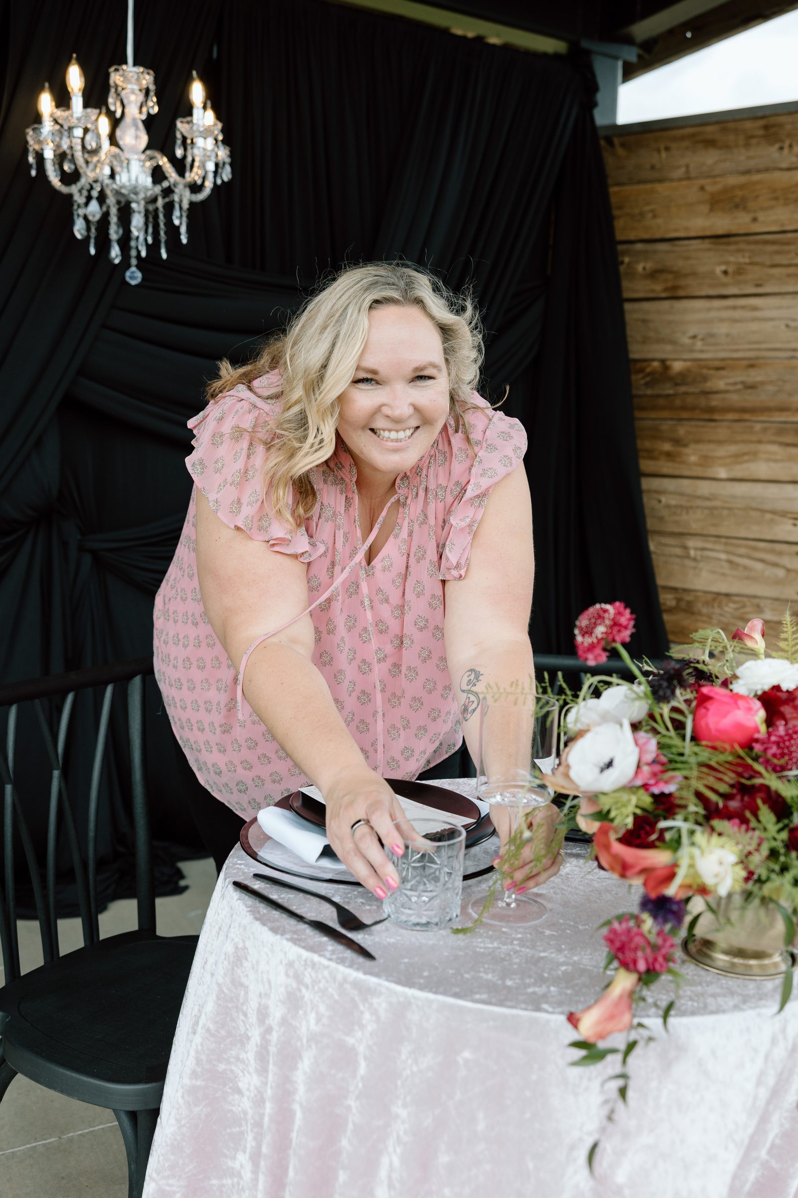 Kelly setting the sweetheart table at Naumes Suncrest Winery.