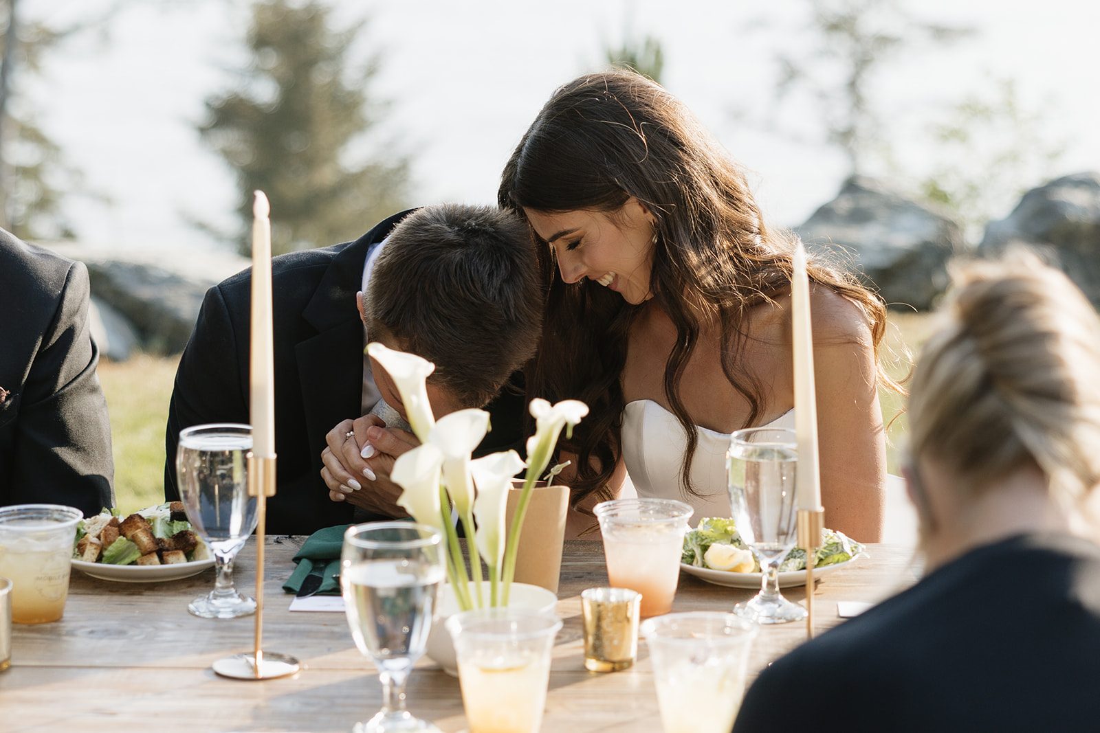 Sweetheart table with calla lilies at a Crook Point reception.